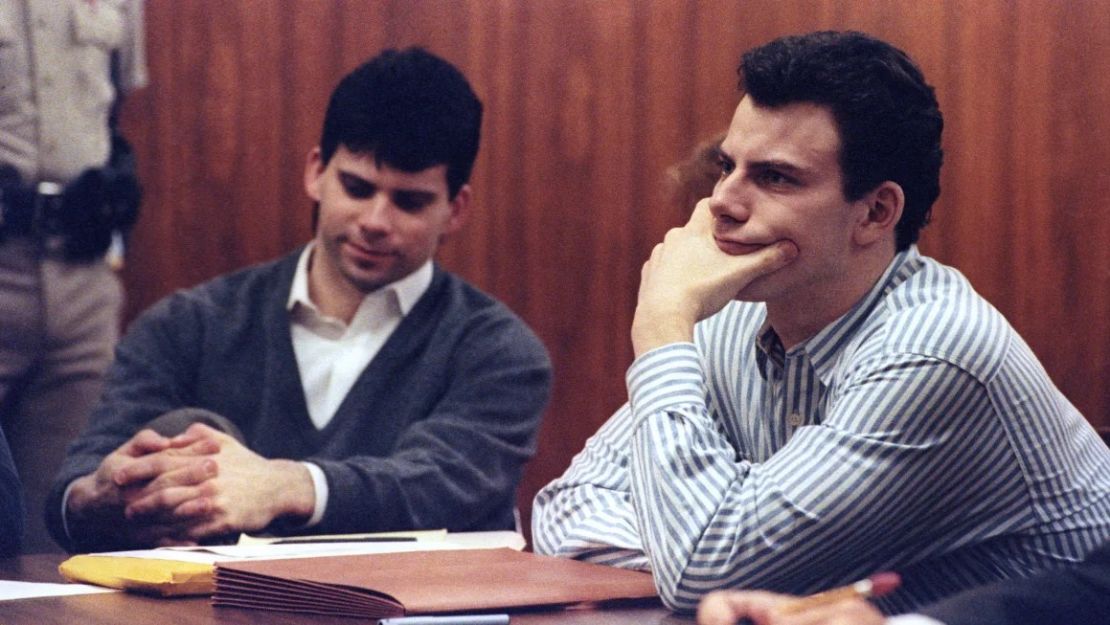 Eric Menendez (right) and his brother Lyle listen to court proceedings during their May 17, 1991 arraignment in the shotgun murder of their wealthy parents in August 1989. Lee Celano/Reuters