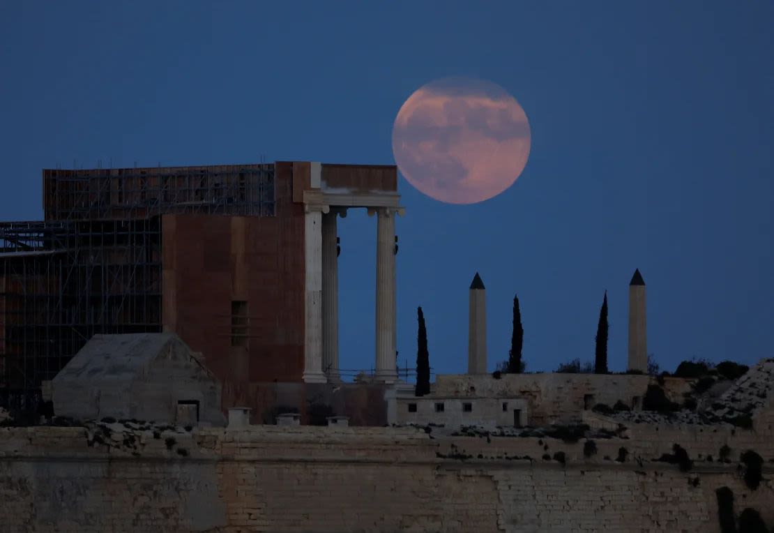 A hunter's moon rises behind the set of director Ridley Scott's upcoming film, 