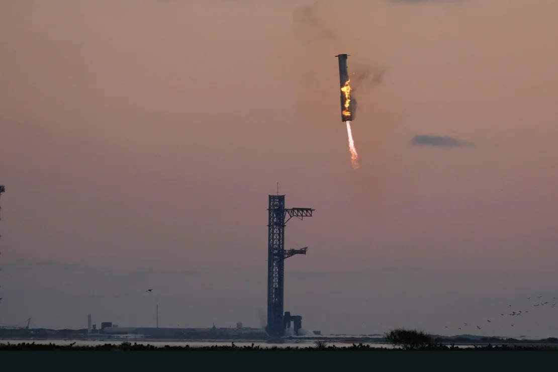 SpaceX's Super Heavy Booster rocket returns to the launch pad to be captured 